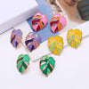 Salma Palm Leaf Enamel Earrings - Large enamel earrings with stylised leaves painted in complimentary shades of enamel paint.