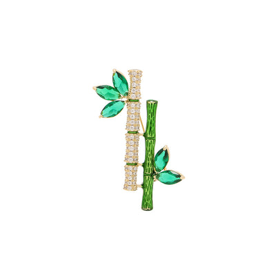 Sasae Crystal Bamboo Brooch - An elegant green brooch designed to look like a pair of stylised bamboo stalks, adorned with green and white crystals.