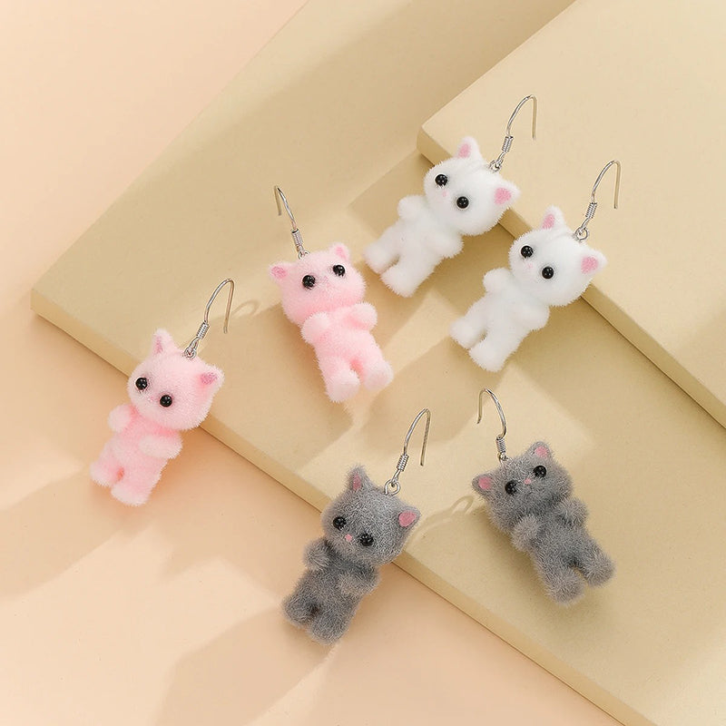 Selina Flocked Velvet Kitten Drop Earrings - Adorable little fuzzy humanoid kitty cat charms suspended from a French hook, available in your choice of grey, white, or pink.