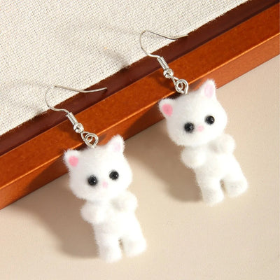 Selina Flocked Velvet Kitten Drop Earrings - Adorable little fuzzy humanoid kitty cat charms suspended from a French hook, available in your choice of grey, white, or pink.