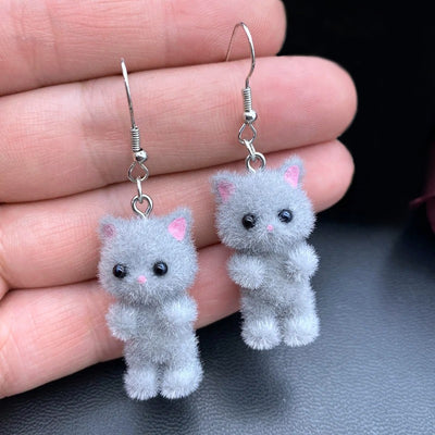 Selina Flocked Velvet Kitten Drop Earrings - Adorable little fuzzy humanoid kitty cat charms suspended from a French hook, available in your choice of grey, white, or pink.