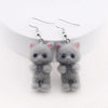 Selina Flocked Velvet Kitten Drop Earrings - Adorable little fuzzy humanoid kitty cat charms suspended from a French hook, available in your choice of grey, white, or pink.