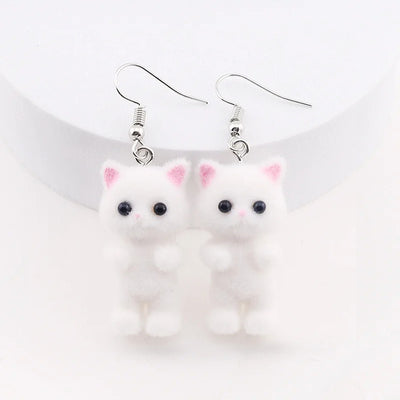 Selina Flocked Velvet Kitten Drop Earrings - Adorable little fuzzy humanoid kitty cat charms suspended from a French hook, available in your choice of grey, white, or pink.