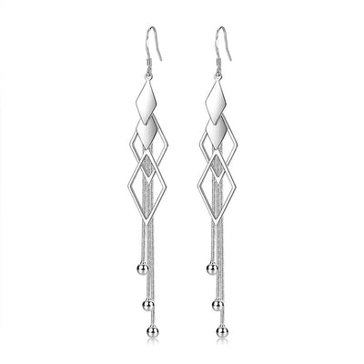 Sienna Dancing Threads Dangle Earrings - Lovely sterling silver earrings featuring interlocking diamonds and long elegant strands.