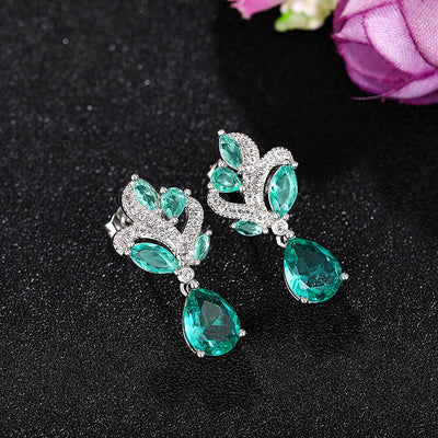 Siobhan Seafoam Spray Crystal Drop Earrings - Tiny, delicate, classic drop earrings featuring an assortment of pear-cut blue-green stones surrounded by tiny round cut quartz.