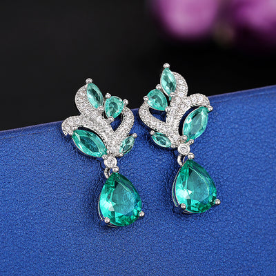 Siobhan Seafoam Spray Crystal Drop Earrings - Tiny, delicate, classic drop earrings featuring an assortment of pear-cut blue-green stones surrounded by tiny round cut quartz.