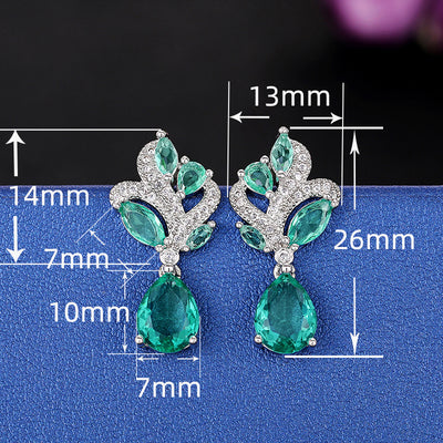 Siobhan Seafoam Spray Crystal Drop Earrings - Tiny, delicate, classic drop earrings featuring an assortment of pear-cut blue-green stones surrounded by tiny round cut quartz.