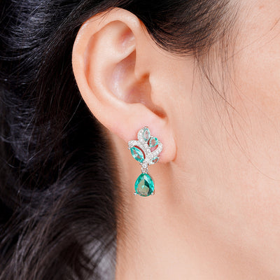 Siobhan Seafoam Spray Crystal Drop Earrings - Tiny, delicate, classic drop earrings featuring an assortment of pear-cut blue-green stones surrounded by tiny round cut quartz.