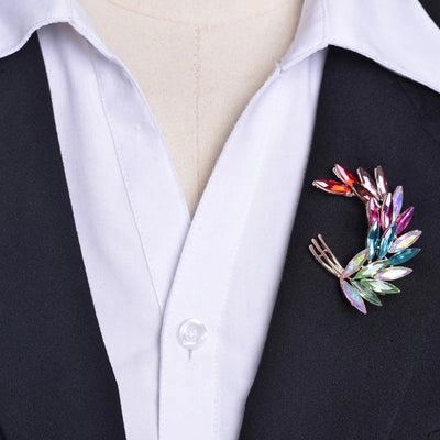 Sitaria Crystal Curved Grain Brooch - An elegant crystal brooch crafted from an assortment of marquise cut crystals arranged to look like heads of grain, in either a golden champagne colour or a rainbow gradient.