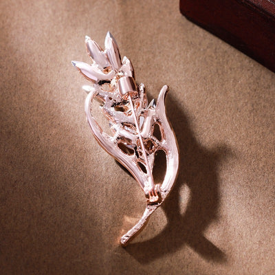 Sitaria Crystal Straight Grain Brooch - An elegant crystal brooch crafted from an assortment of marquise cut crystals arranged to look like heads of grain, in either a golden champagne colour or a rainbow gradient.