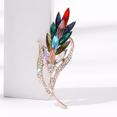 Sitaria Crystal Straight Grain Brooch - An elegant crystal brooch crafted from an assortment of marquise cut crystals arranged to look like heads of grain, in either a golden champagne colour or a rainbow gradient.