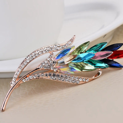Sitaria Crystal Straight Grain Brooch - An elegant crystal brooch crafted from an assortment of marquise cut crystals arranged to look like heads of grain, in either a golden champagne colour or a rainbow gradient.