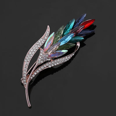 Sitaria Crystal Straight Grain Brooch - An elegant crystal brooch crafted from an assortment of marquise cut crystals arranged to look like heads of grain, in either a golden champagne colour or a rainbow gradient.