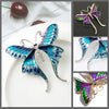 Skylar Long-Tail Butterfly Brooch - A lovely medium-sized butterfly brooch featuring colourful enamel and shiny artificial crystals. Available in your choice of blues or purple and green.