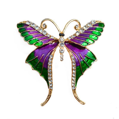 Skylar Long-Tail Butterfly Brooch - A lovely medium-sized butterfly brooch featuring colourful enamel and shiny artificial crystals. Available in your choice of blues or purple and green.