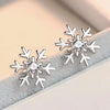 Snow Queen I Jewellery Set - Classic - A delicate snowflake-themed set of necklace and earrings, featuring snowflakes formed from silver branches around a single central crystal in the middle.