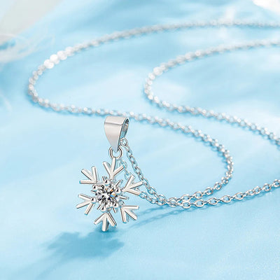 Snow Queen I Jewellery Set - Classic - A delicate snowflake-themed set of necklace and earrings, featuring snowflakes formed from silver branches around a single central crystal in the middle.