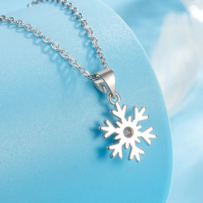Snow Queen I Jewellery Set - Classic - A delicate snowflake-themed set of necklace and earrings, featuring snowflakes formed from silver branches around a single central crystal in the middle.