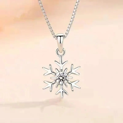 Snow Queen I Jewellery Set - Classic - A delicate snowflake-themed set of necklace and earrings, featuring snowflakes formed from silver branches around a single central crystal in the middle.