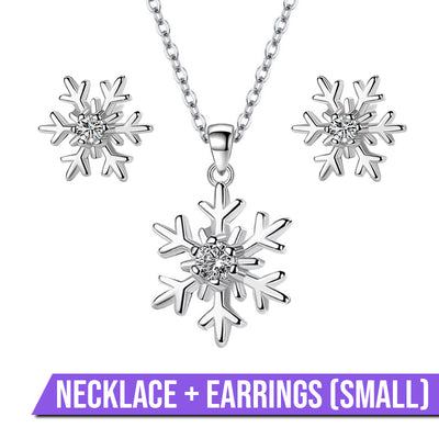 Snow Queen I Jewellery Set - Classic - A delicate snowflake-themed set of necklace and earrings, featuring snowflakes formed from silver branches around a single central crystal in the middle.