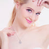 The Snow Queen II Jewellery Set - Crystal Tipped - A delicate snowflake-themed set of necklace and earrings, featuring snowflakes formed from textured silver with crystals set into the centre and tips.