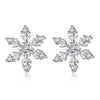 The Snow Queen II Jewellery Set - Crystal Tipped - A delicate snowflake-themed set of necklace and earrings, featuring snowflakes formed from textured silver with crystals set into the centre and tips.