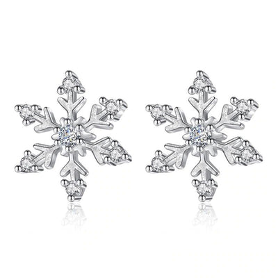 The Snow Queen II Jewellery Set - Crystal Tipped - A delicate snowflake-themed set of necklace and earrings, featuring snowflakes formed from textured silver with crystals set into the centre and tips.