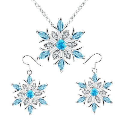 The Snow Queen III Jewellery Set  - Blue Topaz - A beautiful snowflake pendant and earrings with blue topaz and white quartz stones.