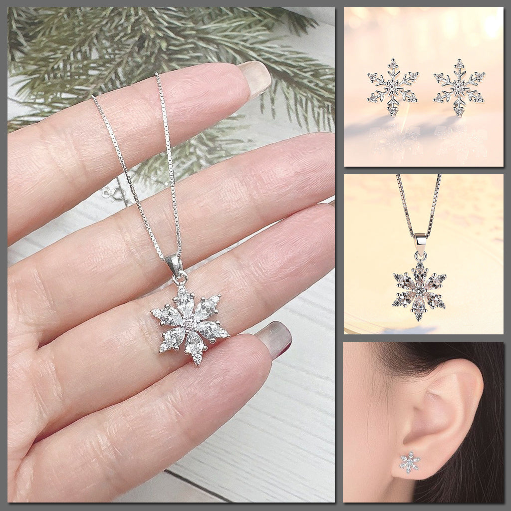 The Snow Queen Deluxe Jewellery Set - A delicate snowflake-themed set of necklace and earrings, featuring snowflakes fully formed from white quartz and set in silver.