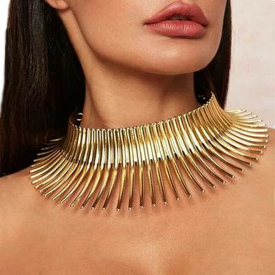 Solaris Radiant Statement Collar - A large metal choker/collar featuring long metal rays radiating out from the wearer's neck.