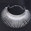 Solaris Radiant Statement Collar - A large metal choker/collar featuring long metal rays radiating out from the wearer's neck.