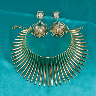 Solaris Radiant Statement Set - A pair of matching earrings and collar featuring long metal rays radiating out from a centre point, like solar rays.