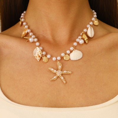 Sora Summer Imitation Seashell Jewellery Set - A large, colourful jewellery set covered in artificial pearls, shells, and cute golden starfish charms.
