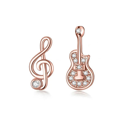 Stefani Music Note & Instrument Crystal Stud Earrings - A pair of teeny tiny asymmetrical stud earrings, one a music note and one a little stylised guitar, made from beautiful 925 Sterling Silver and 14 karat rose gold.