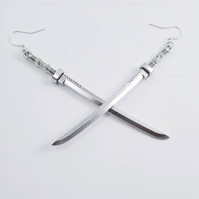 Takeko Gothic Katana Earrings - A pair of large, stylised dark silver toned stylised katana earrings.