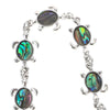 The Tropicana Honu Turtle Bracelet - A beautiful silver turtle bracelet adorned with lovely polished paua shell.