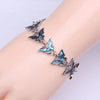 The Tropicana Lani Butterfly Bracelet - A beautiful silver butterfly bracelet adorned with lovely polished paua shell.