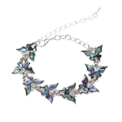 The Tropicana Lani Butterfly Bracelet - A beautiful silver butterfly bracelet adorned with lovely polished paua shell.