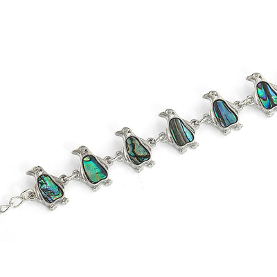 The Tropicana Manu Penguin Bracelet - A beautiful silver penguin bracelet adorned with lovely polished paua shell.