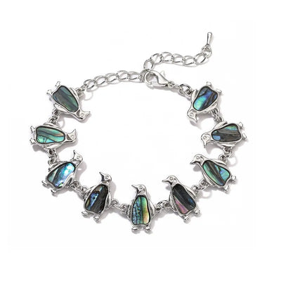 The Tropicana Manu Penguin Bracelet - A beautiful silver penguin bracelet adorned with lovely polished paua shell.