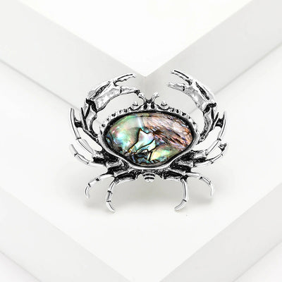 The Tropicana Papa'i Crab Brooch - A beautiful silver-toned zinc alloy crab brooch adorned with polished paua shell.