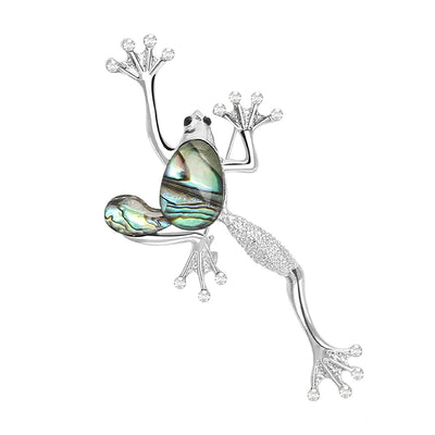 The Tropicana Poloka Frog Brooch - A beautiful silver-toned zinc alloy frog brooch adorned with crystals and polished paua shell.