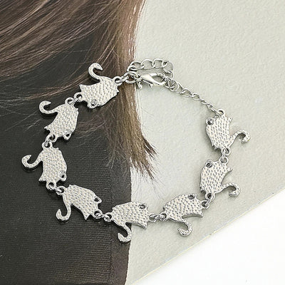 The Tropicana Ululani Swan Bracelet - A beautiful silver swan bracelet adorned with lovely polished paua shell.