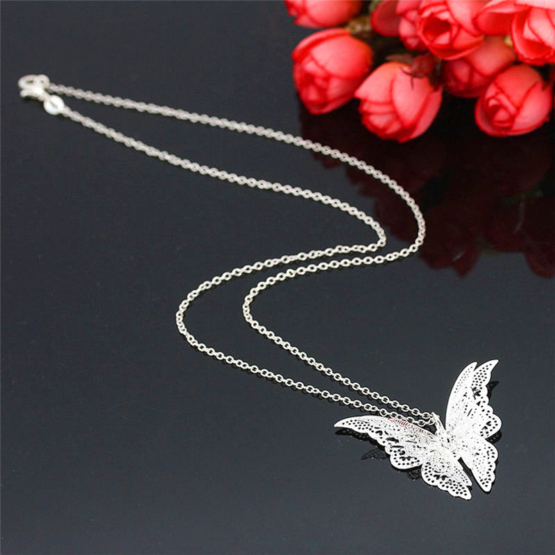 The Vanessa Necklace - A simple silver butterfly, intricately detailed in a lace-like style. 