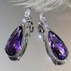 Verona Teardrop Crystal Drop Earrings - Elegant, classic drop earrings featuring a large purple central stone surrounded by tiny white quartz.