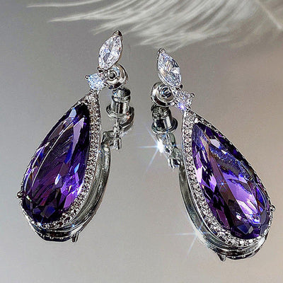 Verona Teardrop Crystal Drop Earrings - Elegant, classic drop earrings featuring a large purple central stone surrounded by tiny white quartz.