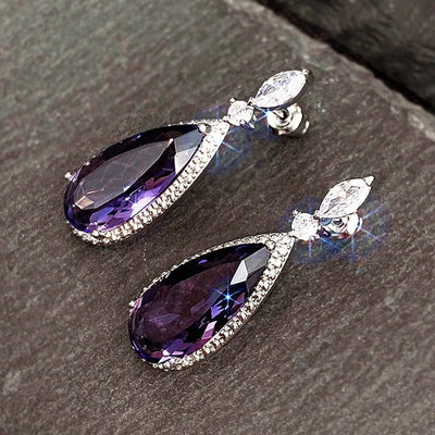 Verona Teardrop Crystal Drop Earrings - Elegant, classic drop earrings featuring a large purple central stone surrounded by tiny white quartz.