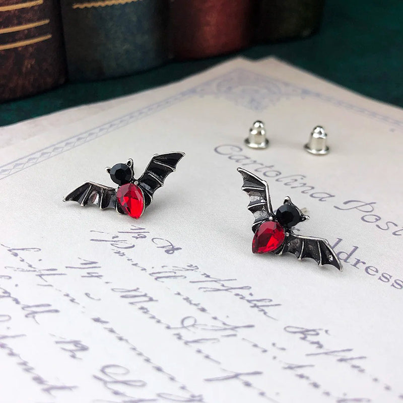 Wednesday II Bat Stud Earrings - Adorable gothic stud earrings shaped like an itty bitty bat, studded with gorgeous crystals.