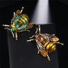 Buzzy Wuzzy Bumblebee Brooch - A cute stylised enamel bumblebee brooch, available in six different colour palettes.