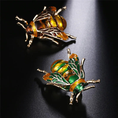 Buzzy Wuzzy Bumblebee Brooch - A cute stylised enamel bumblebee brooch, available in six different colour palettes.